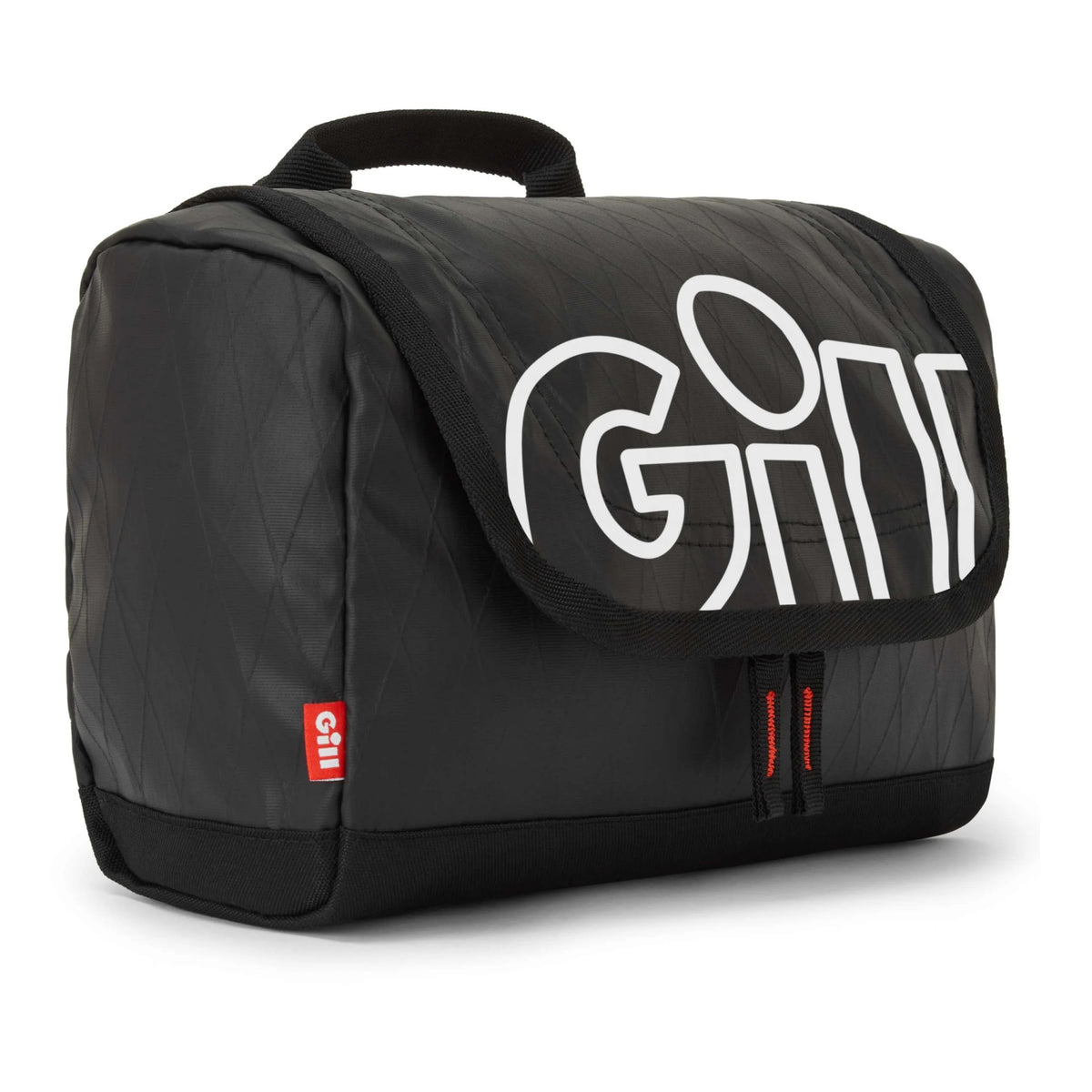 A black Gili travel pouch with a large white Gili logo on the front flap, featuring a top carry handle and zippered compartments, shown on a white background.