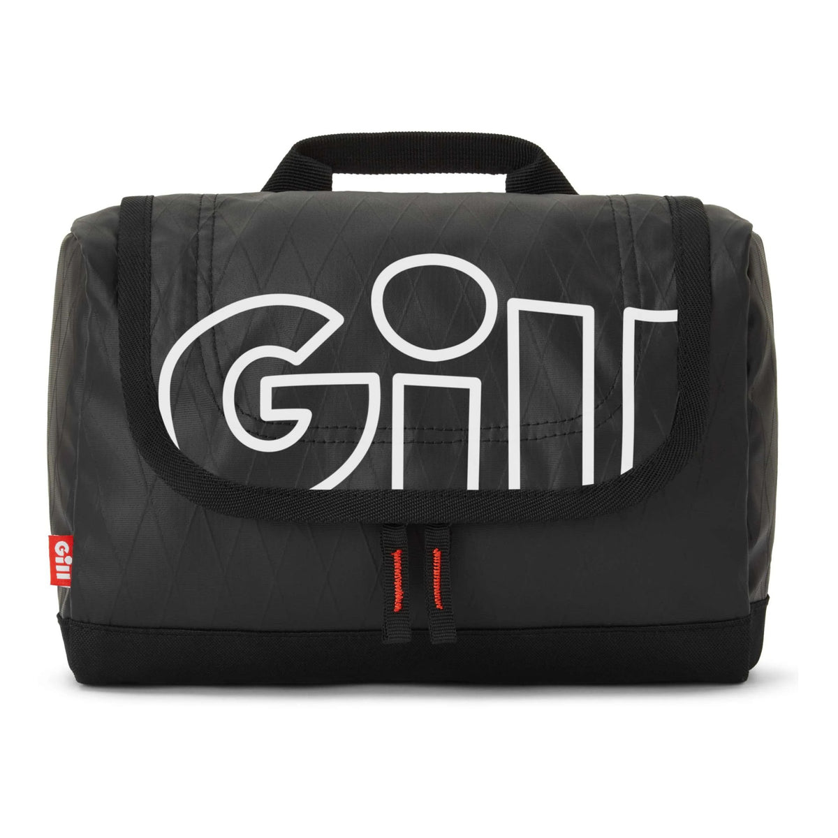 A black quilted GILL travel bag with a large white outlined 'GILL' logo on the front flap, featuring a top carry handle and a small red GILL tag on the left side.