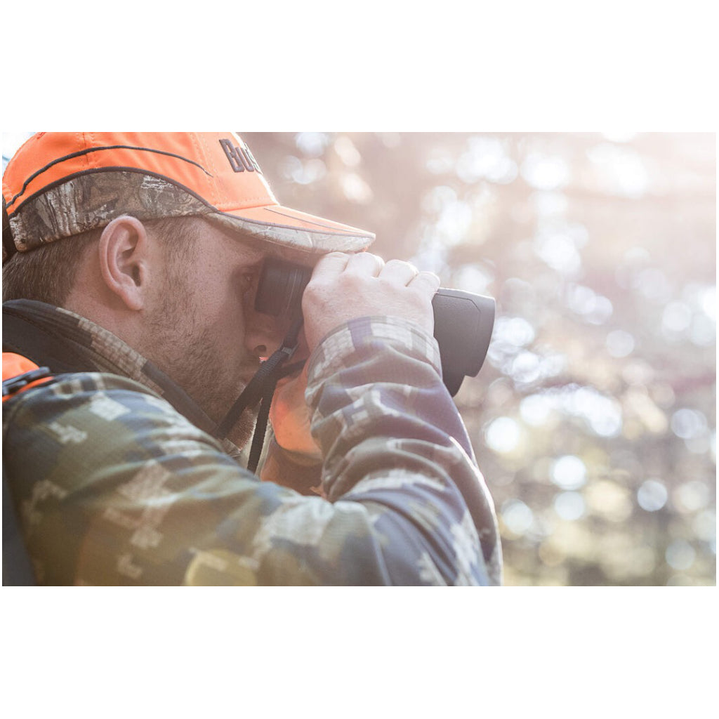 Man using Bushnell Powerview 7 X 50 Binocular.