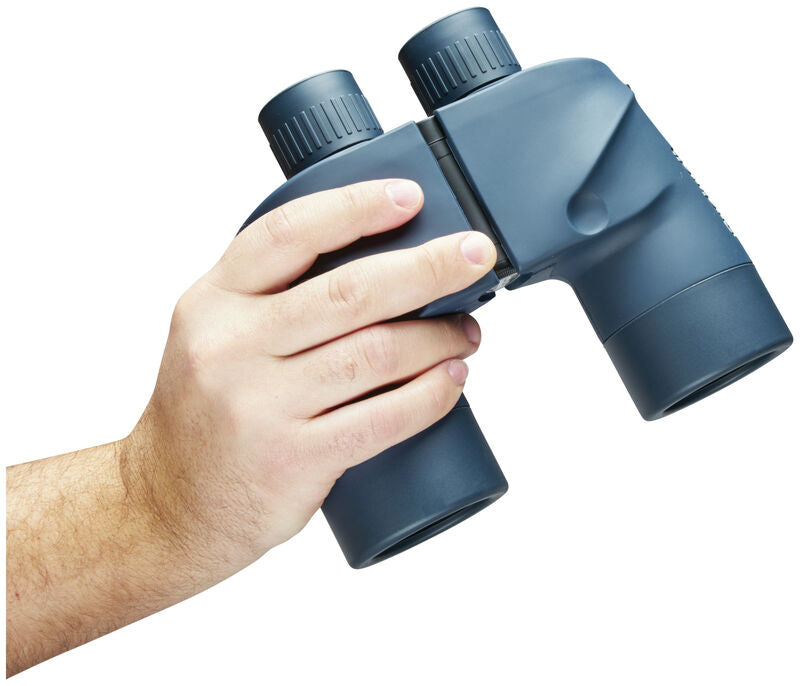 Hand Holding Bushnell 7 X 50 Marine Center Focus Binocular.