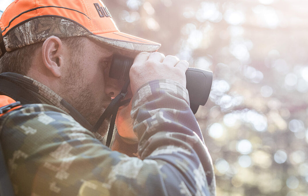 Person Using Of Bushnell 7 X 50 Marine Center Focus Binocular.