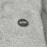 Gill logo on a textured gray fabric background