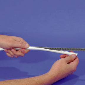 Person holding Stay Cable Cover.