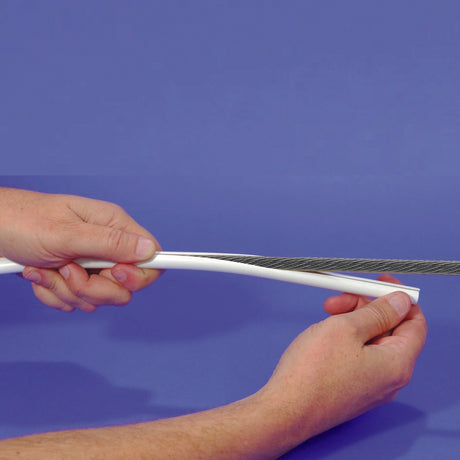 Person holding Stay Cable Cover.