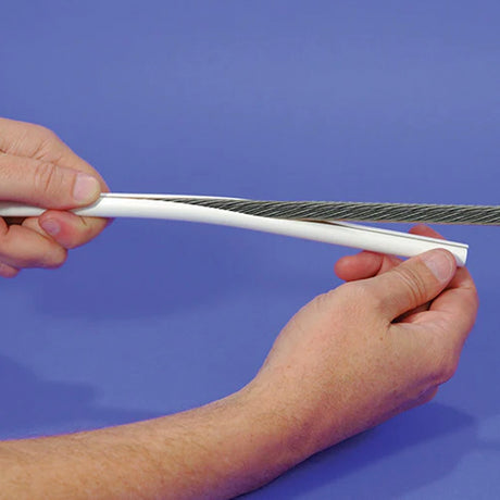 Person holding 1/4 Stay Cable Cover