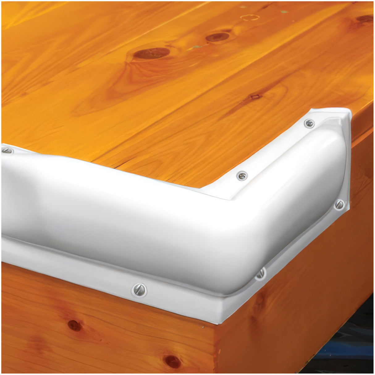 Wooden surface with a white corner guard