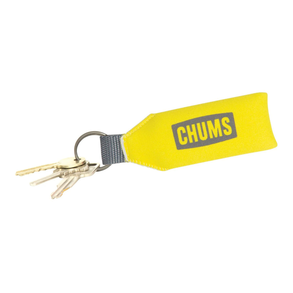 Yellow keychain with 'CHUMS' logo on a white background