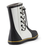 Black and white rain boot with yellow trim on a white background