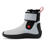 A high-top athletic boot shown in profile against a solid white background. The boot features a light gray knit upper with black panels, a black sole, and a black ankle strap closure with a red pull tab.