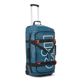 A blue rolling duffel bag with an extended telescoping handle, black compression straps, and a large white graphic logo on the front, set against a plain white background.