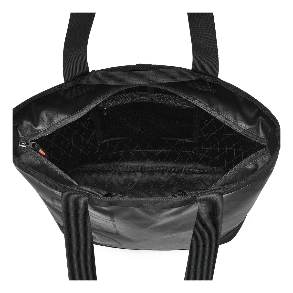 Black tote bag shown open from the front, displaying its interior with a zippered pocket, mesh organizer, and quilted pattern lining, on a solid white background.