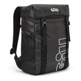 A black GILL backpack with white logo branding, featuring a roll-top design, side mesh pocket, and front compression straps, shown on a plain white background.
