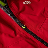 Close-up of a red jacket with a zipper and Gill logo.