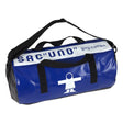 A blue and black duffel bag with a white stripe across the top featuring the text 'SAC-UNO guy cotten' and a white stick figure logo, shown on a plain white background.