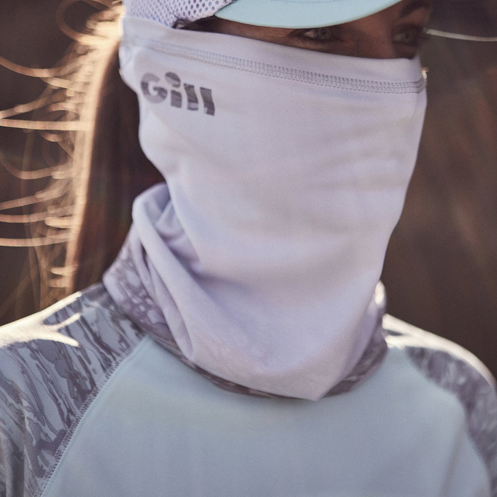 Woman wearing Gill Expedition UV Neck Gaitor.