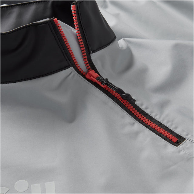 Close up of zipper of light grey gill smock.