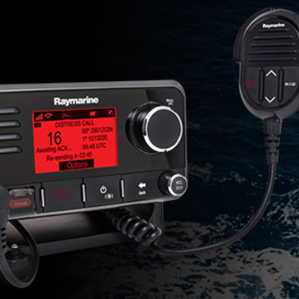 Raymarine marine radio with digital display and speaker against a dark water background