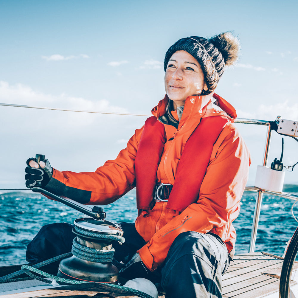 Woman at winch in colder weather