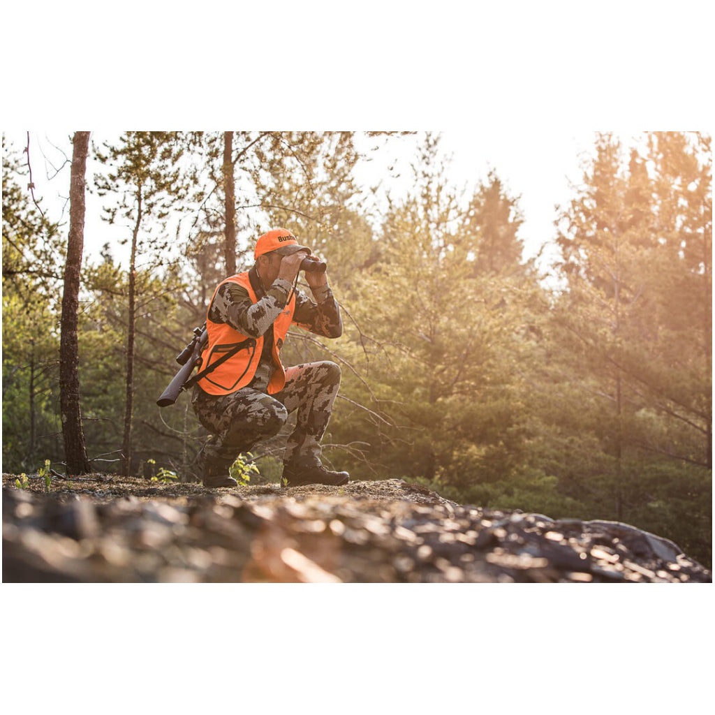 Man on ridge using Bushnell Powerview 7 X 50 Binocular.