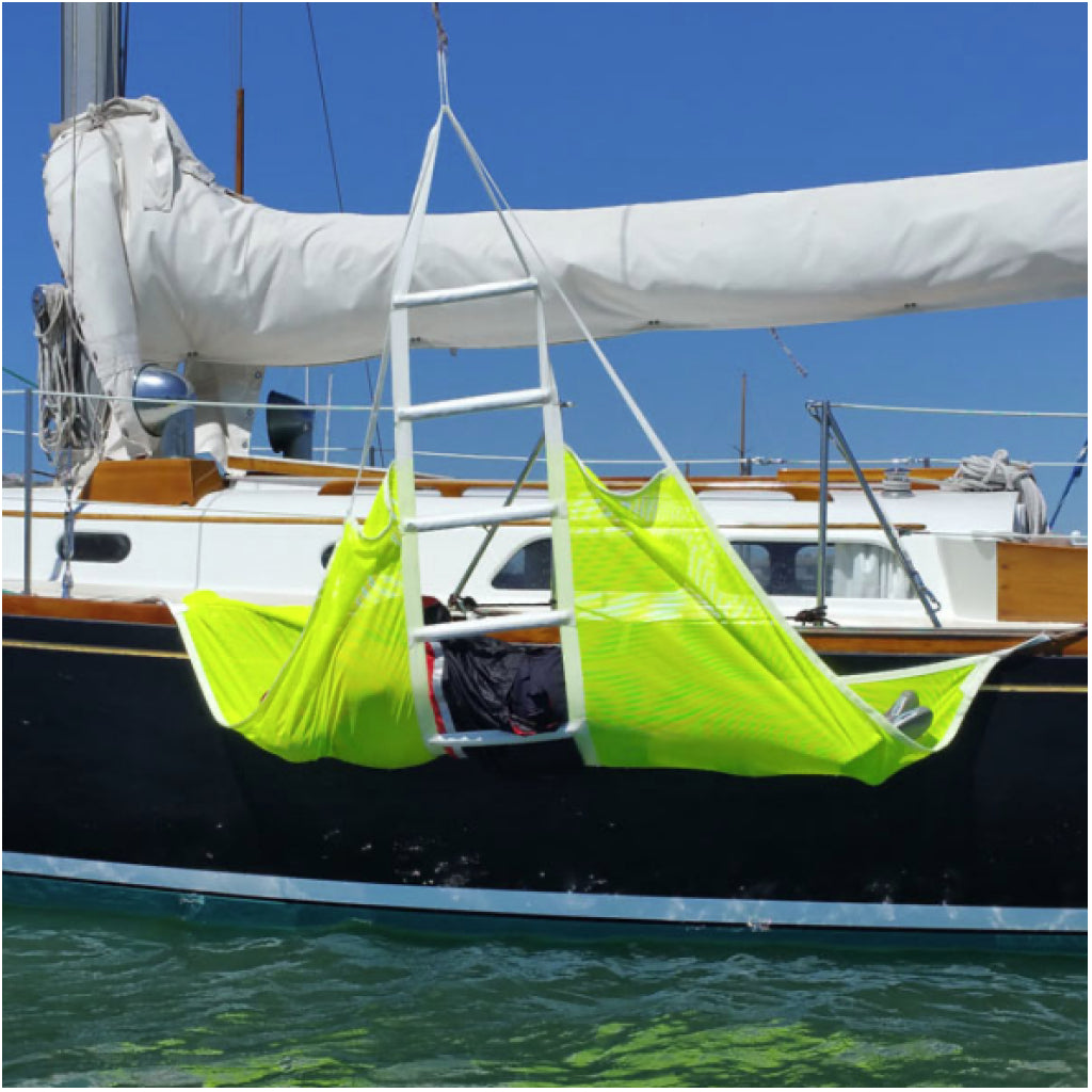 Person Being Raised In  SOS Marine Recovery Ladder.