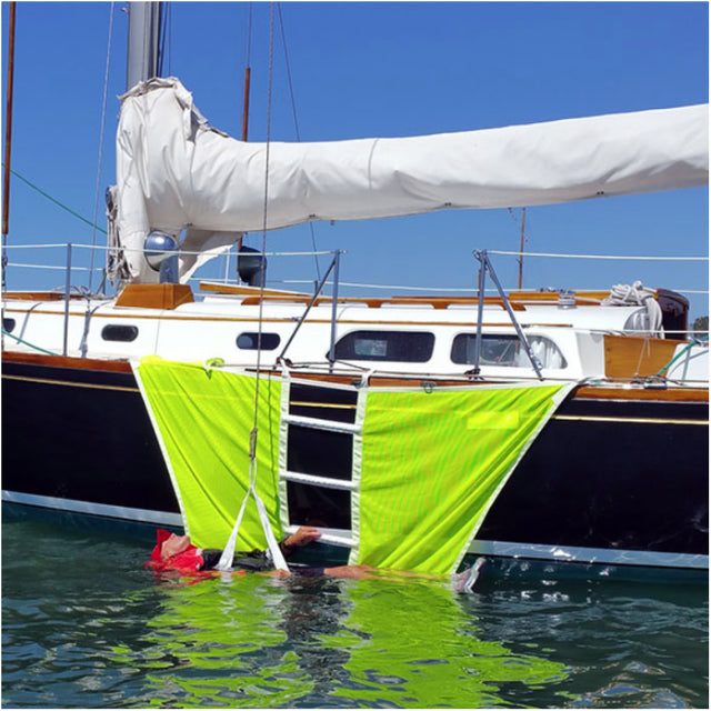 Person being lifted with SOS Marine Recovery Ladder.